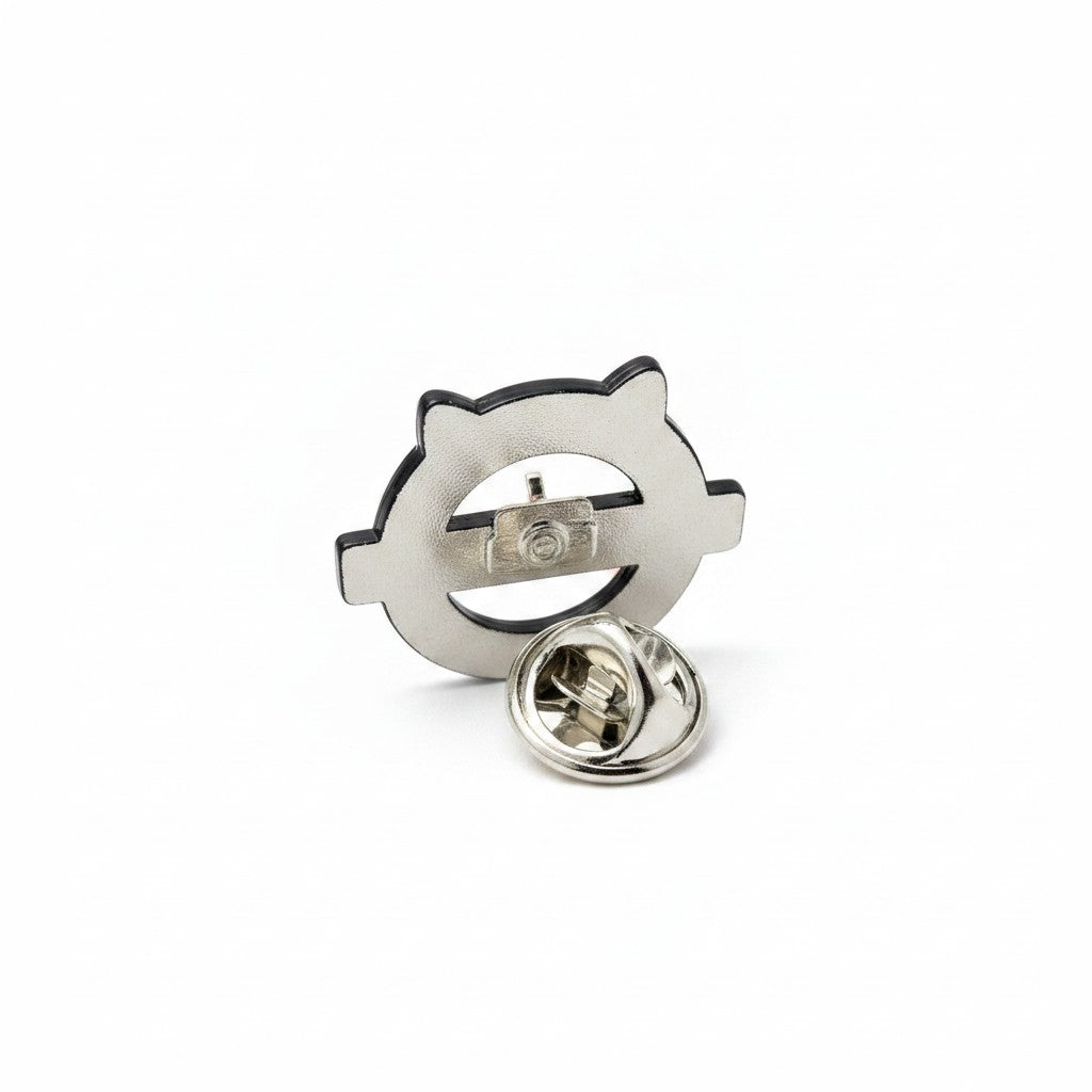 The RevenueCat Swag Store round cat logo enamel pin showing the metal back and secure clutch fastener.