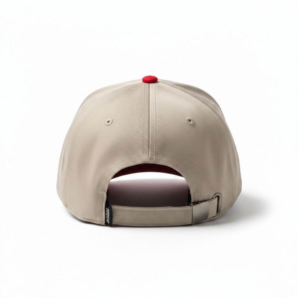 The RevenueCat Swag Store khaki baseball cap with a red top button and adjustable back strap, rear view.