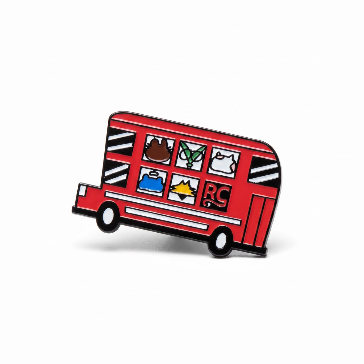 The RevenueCat Swag Store red double-decker bus enamel pin with illustrated passengers in windows