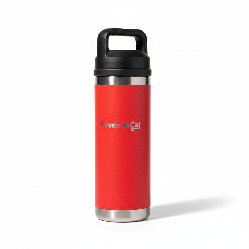The RevenueCat Swag Store red insulated stainless steel beverage bottle with a black leak-resistant handle cap.