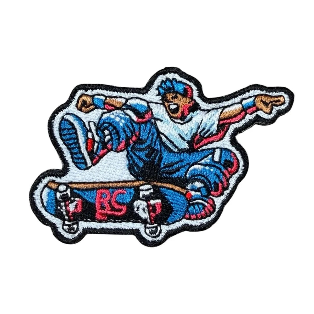 The RevenueCat Swag Store embroidered iron-on patch featuring a 90s style skateboarder performing a trick.
