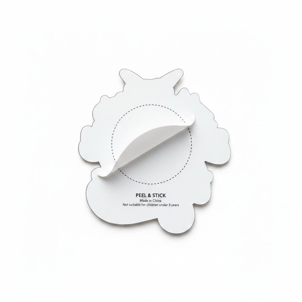 The RevenueCat Swag Store vinyl sticker back view showing the peel and stick adhesive backing on a white background.